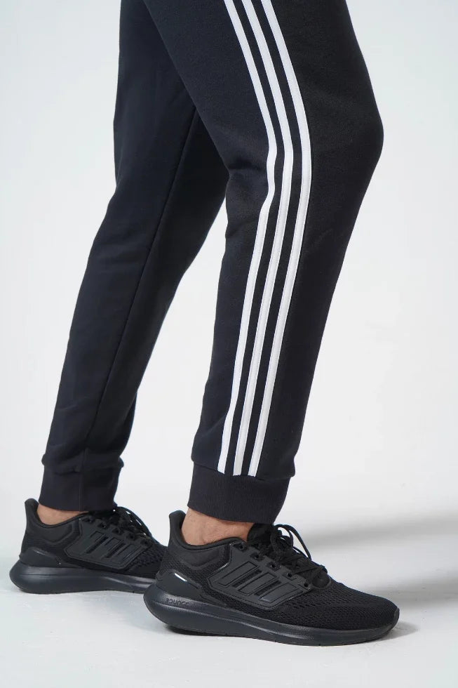 ESSENTIALS FRENCH TERRY TAPERED CUFF 3-STRIPES PANTS